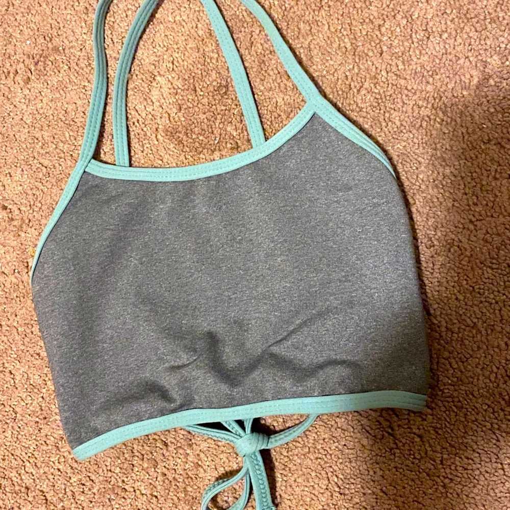grey and teal sports bra with straps on the back GREAT CONDITION